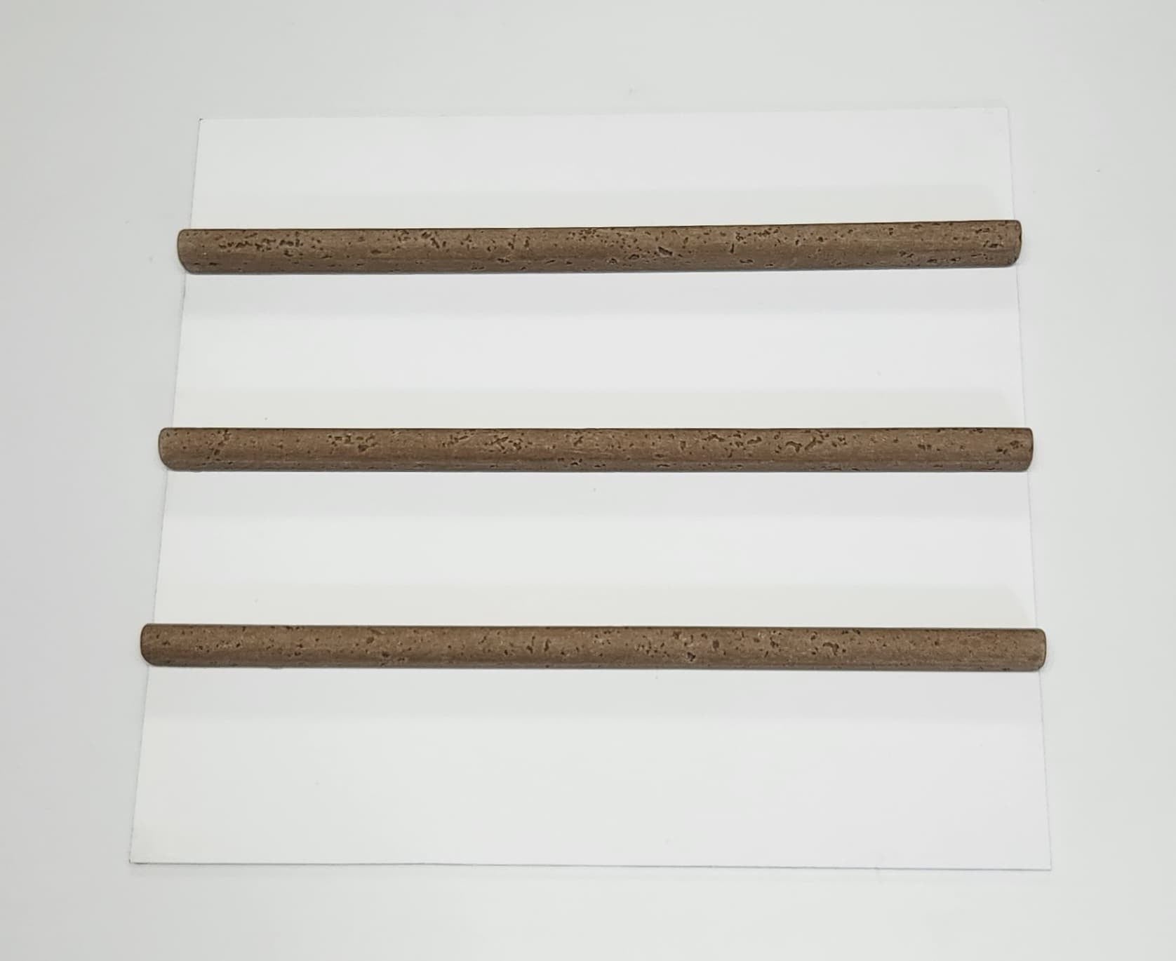 LMS30522002 LAPIZ MARMOL TRAVERTINO DARK 2x25 cm (set x 3 unid.)