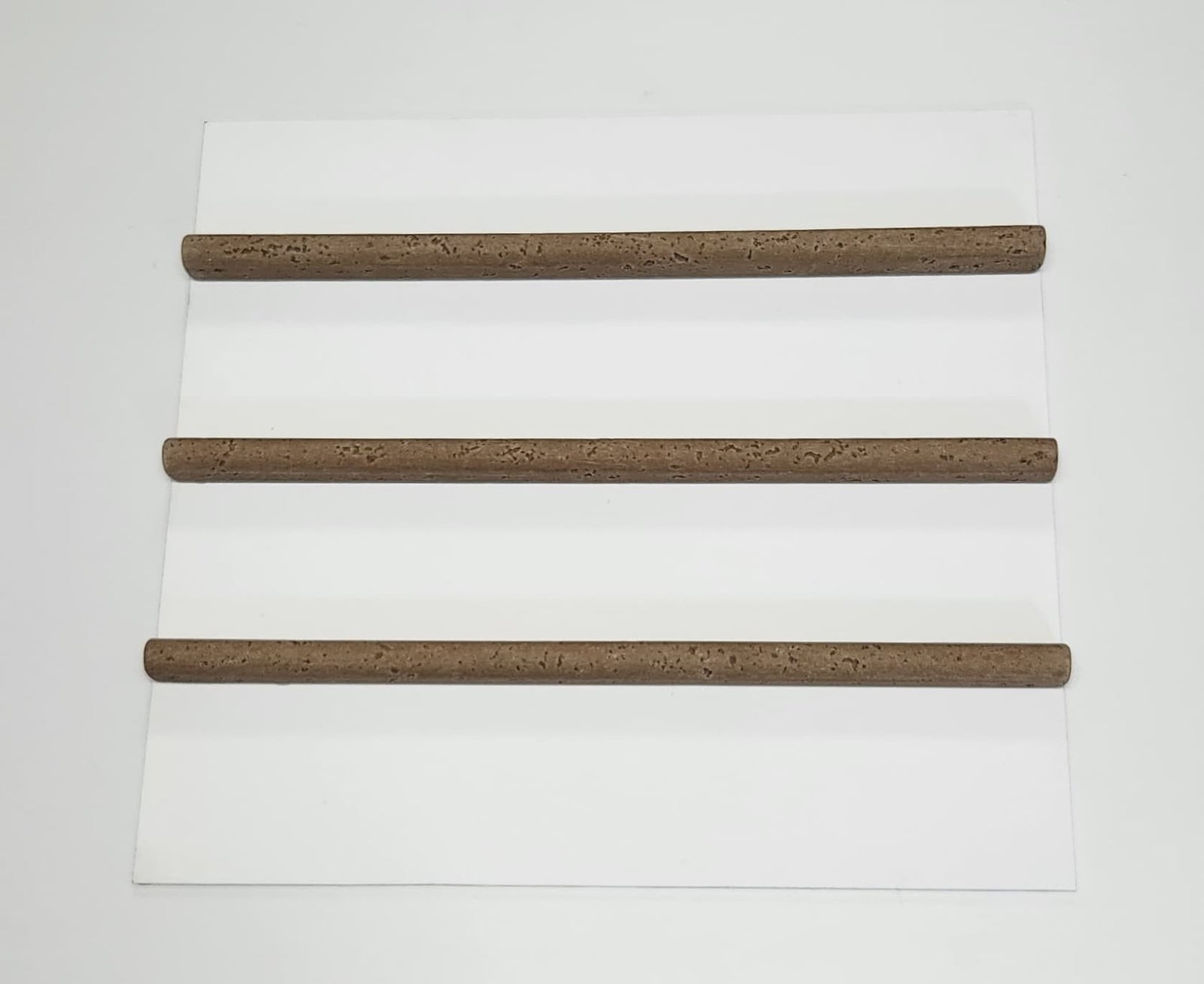 LMS30522002 LAPIZ MARMOL TRAVERTINO DARK 2x25 cm (set x 3 unid.)